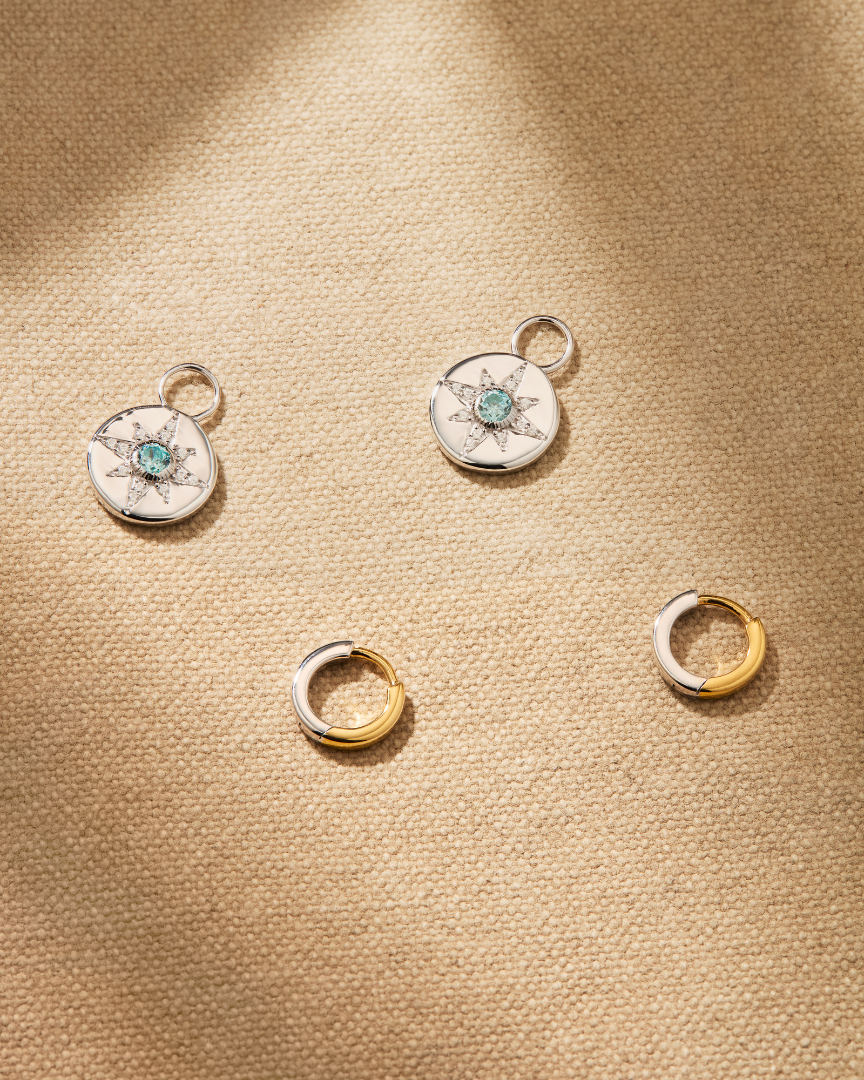 Vega silver charm earrings with vintage star motif and crystals attached to small hoop earrings